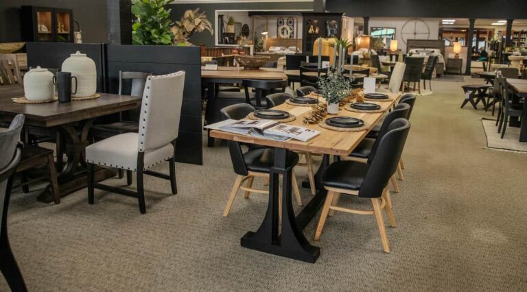 Stylish furniture showroom with dining tables and chairs.
