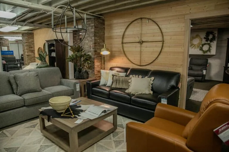 Cozy furniture showroom with sofas and armchairs.