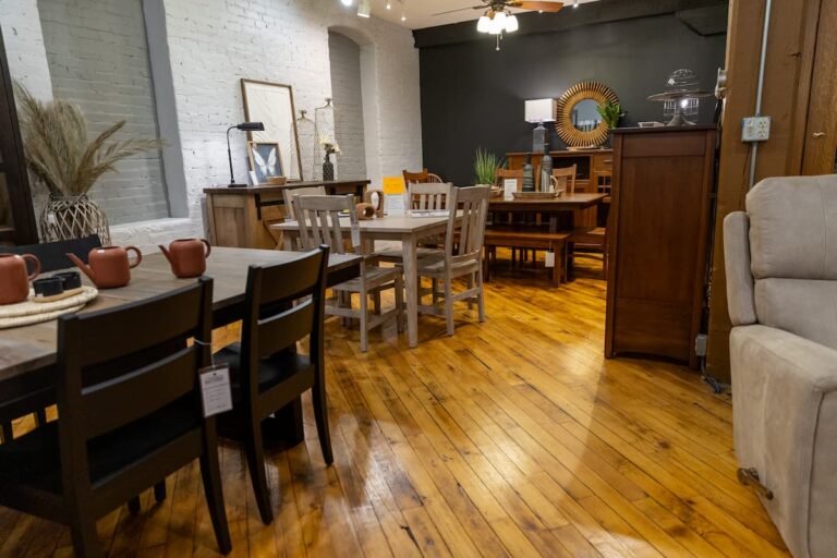 Cozy furniture showroom with tables and chairs.
